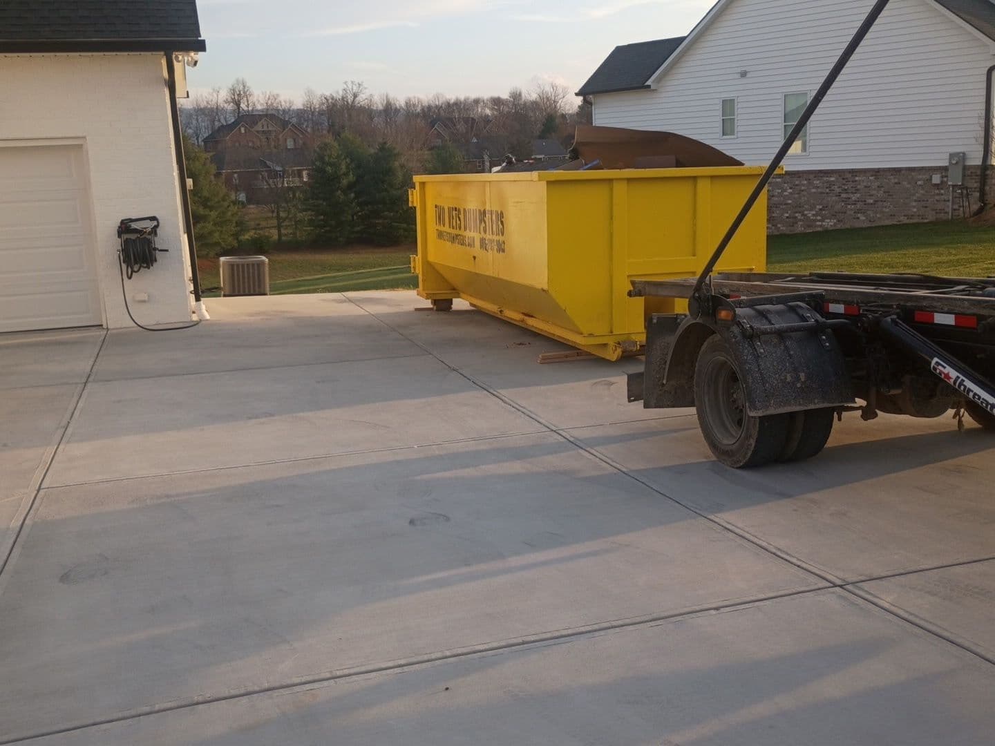 Project Driveway Safe Yellow Dumpsters Ready for Home Projects image