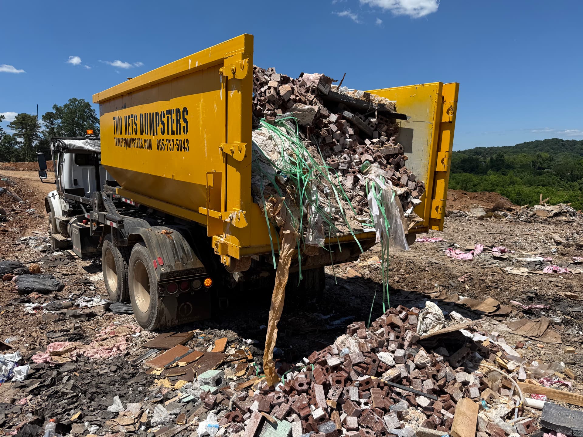 Heavy Construction Debris Hauled Away the Right Way image